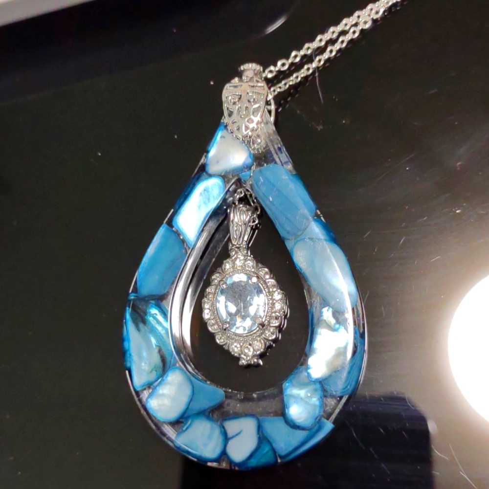 Aquamarine  stone in a resin in s s316 3 in height  3 ctw gem